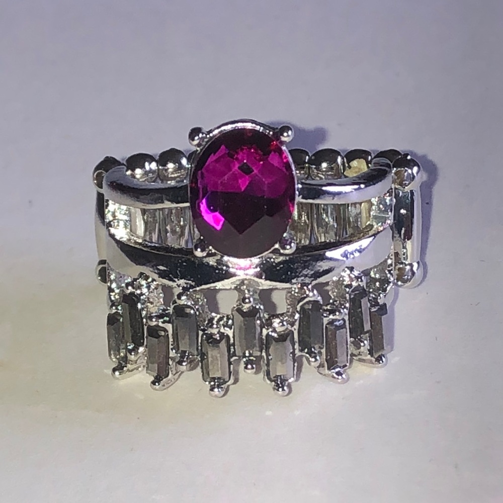Silver Tone Ring with Fuchsia Oval Center Stone and Clear Accents